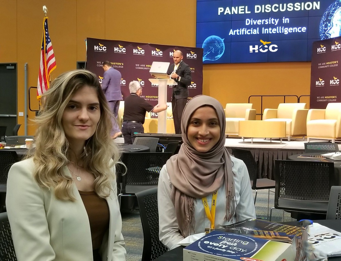 Students attend an AI conference.