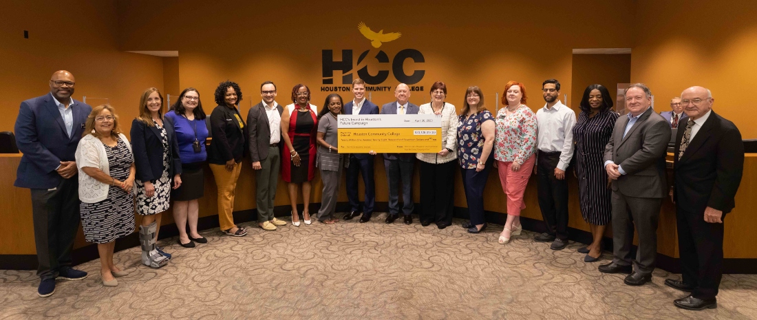 A check presentation at the HCC Board of Trustees meeting